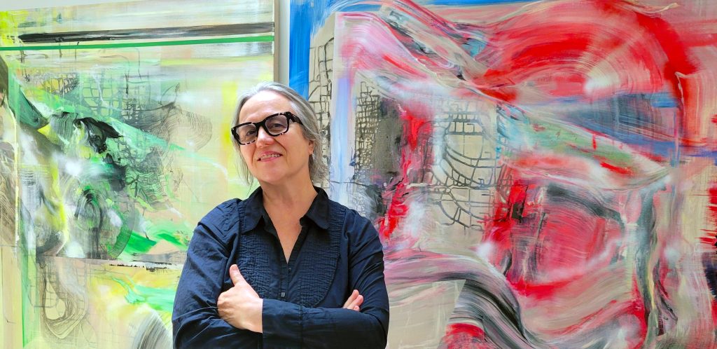 mpo studio portrait w two paintings